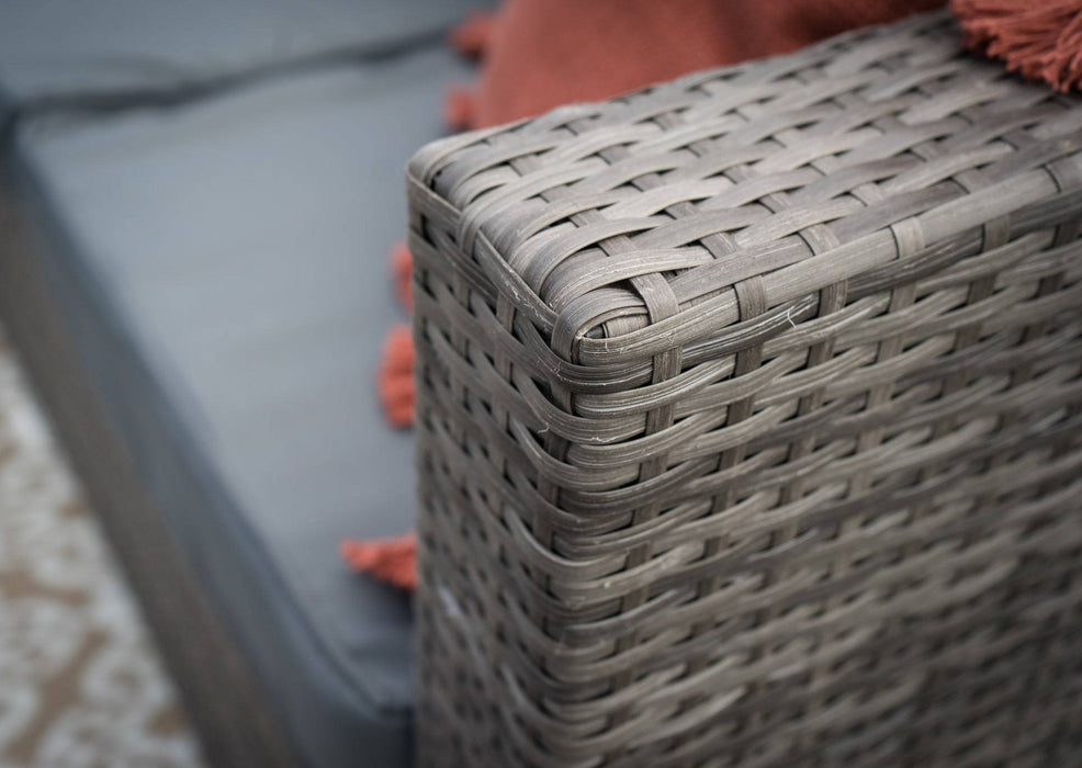 grey outdoor rattan furniture with dark grey cushions 